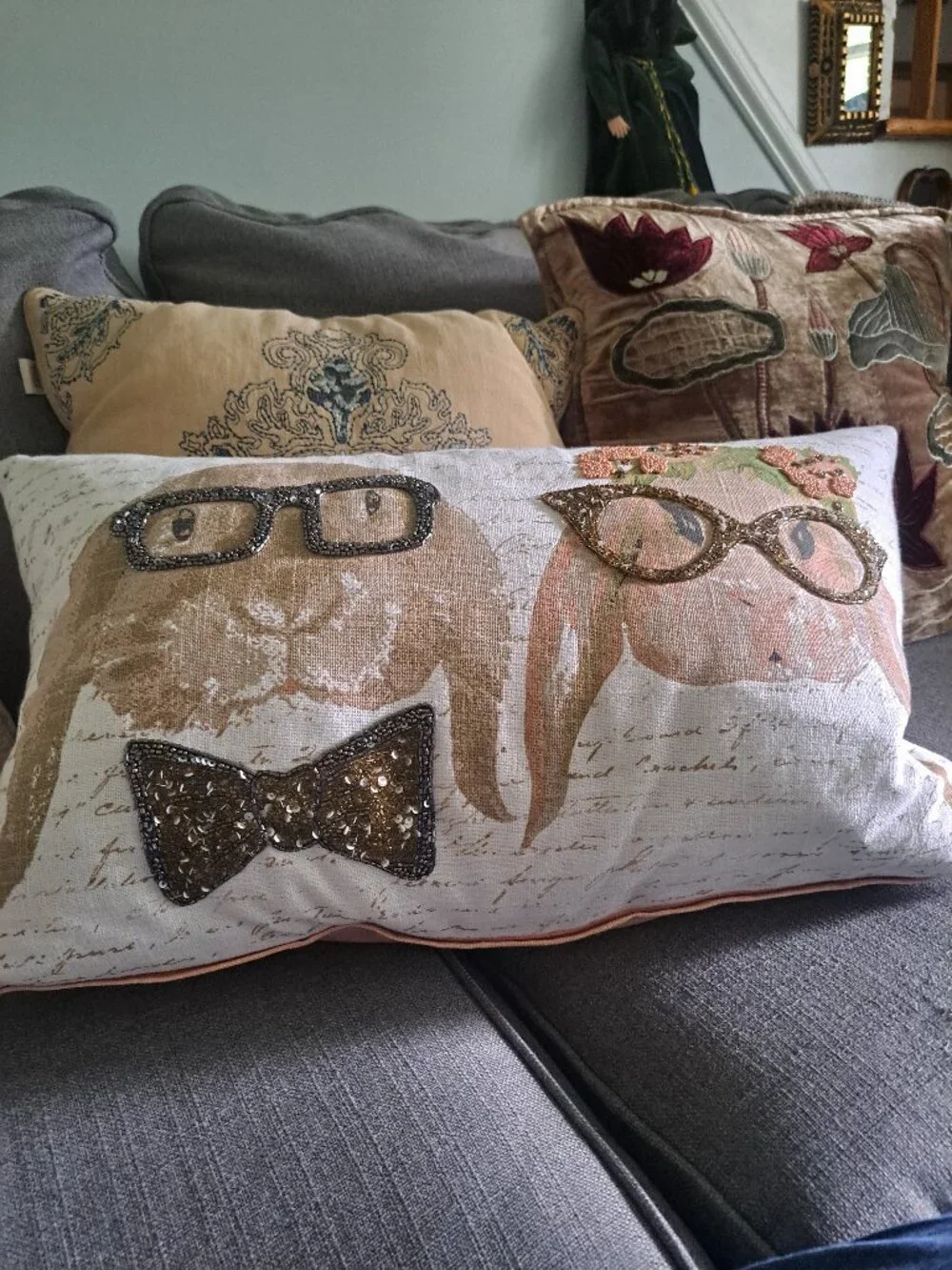 Whimsical rectangular throw pillow has a linen-like fabric base with a printed s